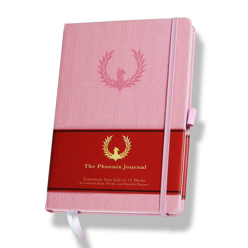 فينيكس بلانر The Phoenix Journal - أفضل منظم وتقويم لتخطيط الأهداف اليومية لتحديد الأهداف والامتنان والسعادة والإنتاجية - لوحة الرؤية وتتبع العادات - غلاف فني غير مؤرخ لمدة 12 أسبوعًا (وردي) - Image 1